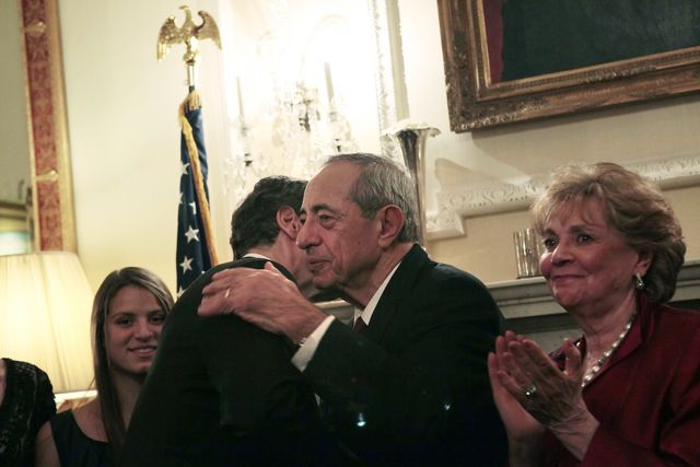 At his son's swearing-in as Governor in 2010